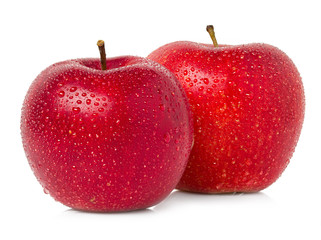 Red apples with water drops isolated