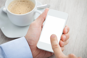 Businessman's Hand Holding Cellphone With Blank Screen