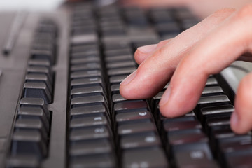 Man Using Computer Keyboard
