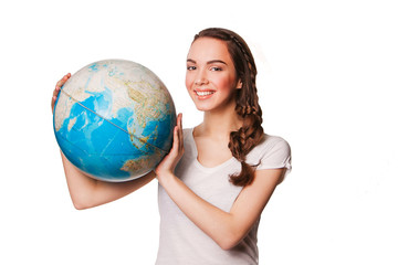 smiling young woman holding a globe in his hands