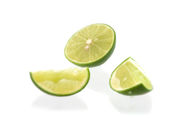 Slice limes on white background isolation