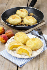 Peach in pastry, popular austrian dish. Garden party table