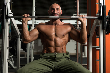 Healthy Mature Man Doing Exercise For Shoulder