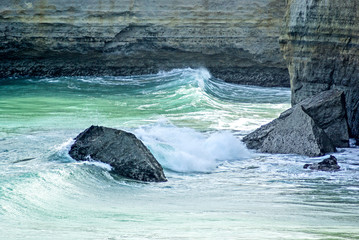 Shipwreck coast wave and rocks