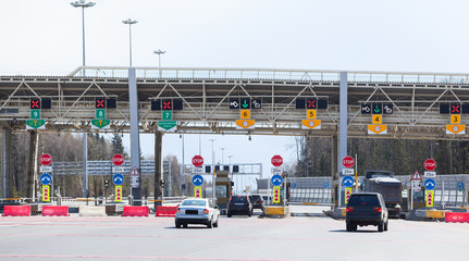 Point payment of travel on toll road with riding vehicles