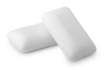 Two pieces of chewing or bubble gums isolated on white