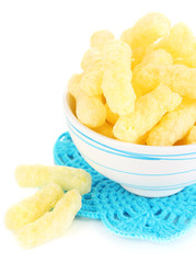 Air corn sticks in bowl isolated on white