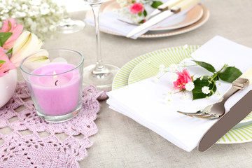 Table setting with spring flowers close up