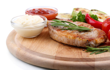 Grilled steak with spices, herbs and vegetables