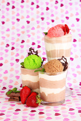 Tasty chocolate mousse with sorbet on bright background