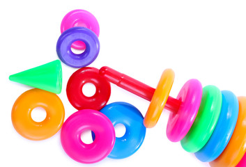 Plastic toy pyramid isolated on white