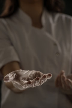 Female Doctor Holding Something Hands