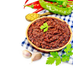 Adjika with hot pepper on a napkin