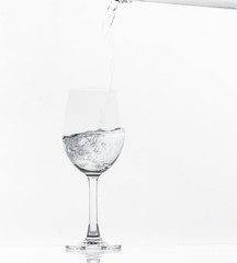 Pouring water on glass