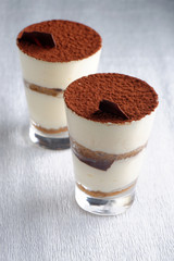 Traditional Italian dessert tiramisu in a glass