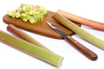 Chopped rhubarb on a wood cutting board
