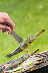 Grilled sardins on fire