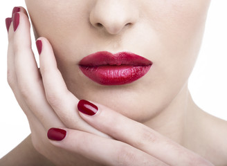Naklejka premium Rossetto rosso e smalto rosso