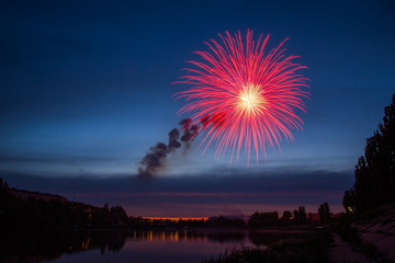 Fireworks Over Lake at Night