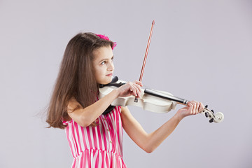 Female child playing the violin