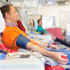 Blood donor at donation.