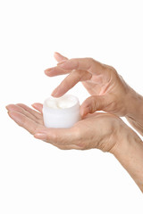 Woman applying cream