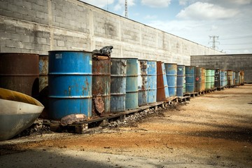 Several barrels of toxic waste at the dump - 65108748