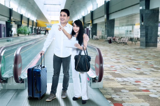 Young couple at airport