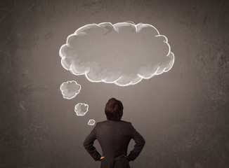 Businessman with cloud thought above his head