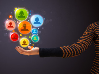 Fototapeta premium Social network icons in the hand of a woman