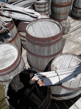 Wooden barrels at a pier