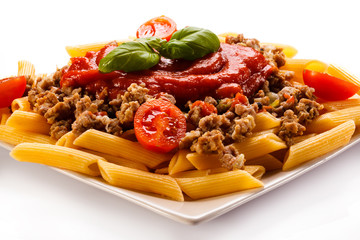 Pasta with meat, tomato sauce, parmesan and vegetables