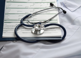 Doctor's stethoscope on the form