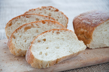 Sliced ciabatta bread on the board