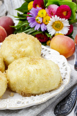 Peach in pastry, popular austrian dish. Garden party table