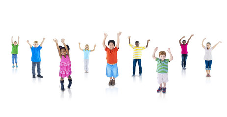 Multi-Ethnic Children with Their Arms Raised