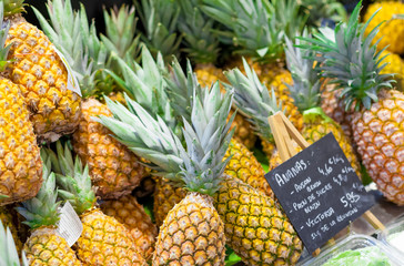 Pineapples for sale in a supermarket