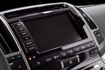 Obraz na płótnie Canvas Panel of a modern car. Screen multimedia system.
