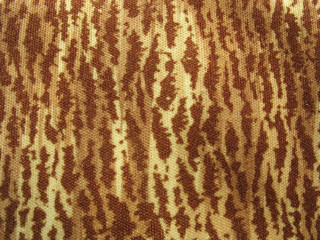 Brown and yellow multicolored fabric background