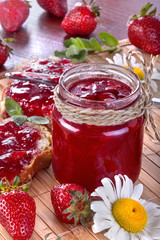 .Fresh and healthy homemade strawberry jam on the table