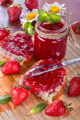 .Fresh and healthy homemade strawberry jam on the table