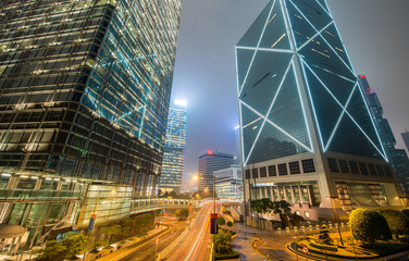 Fototapeta na wymiar Upward view of Hong Kong Central skyscrapers at night