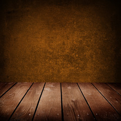 old room with brown wall and wooden floor