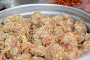 Sausage in the pot for cooking