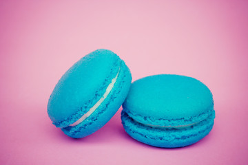 Sweet  french macaroons on retro-vintage background