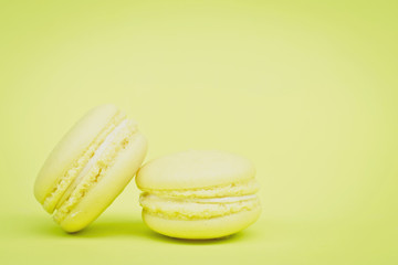 Sweet  french macaroons on retro-vintage background