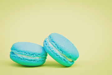 Sweet  french macaroons on retro-vintage background
