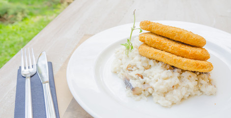 Soya schnitzel on a white plate at a garden restaurant