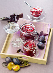 Stewed plums with basil