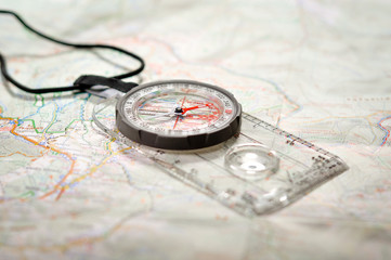 The concept of navigation in the area. Map and compass